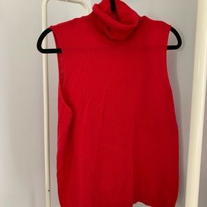 Red sleeveless turtleneck.